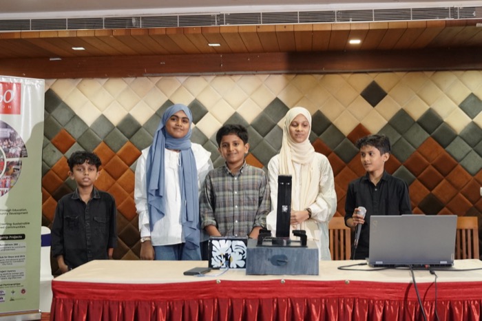 Students presenting the Gas Stove Automation System